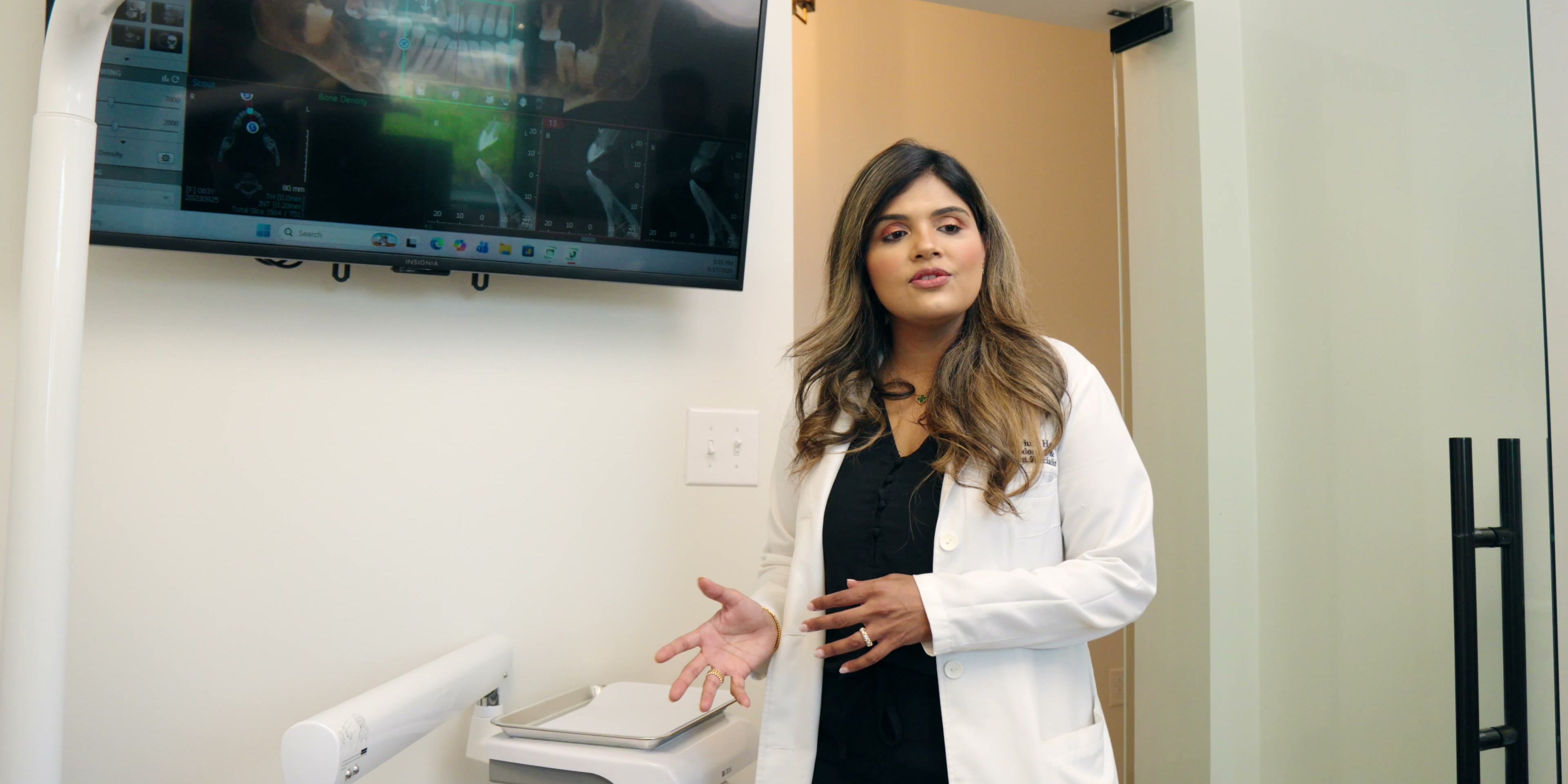 Dr. Marrium Haroon talking through a case at the operatory screen